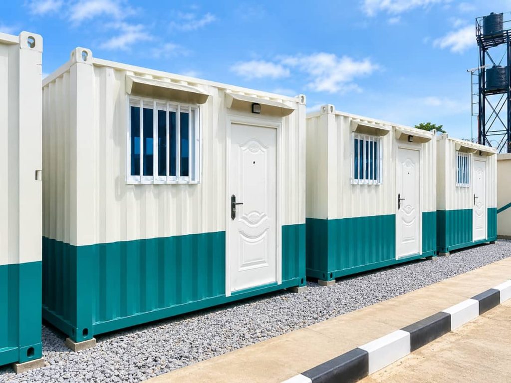 Row of cream and green porta-cabin site offices